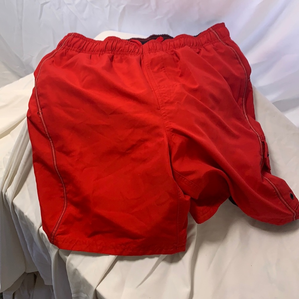 Red Nike swim shorts